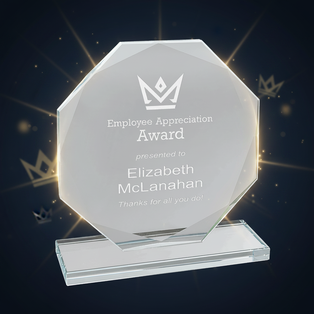 Clear glass award with 'Employee Appreciation Award' text and a crown logo on a green background