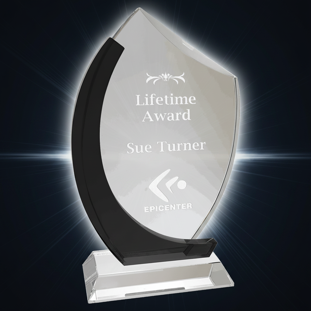 Awards trophy with 'Lifetime Award Sue Turner' engraved on a clear background