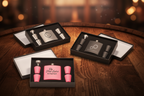 Three flask sets with personalized designs in black boxes on a white background