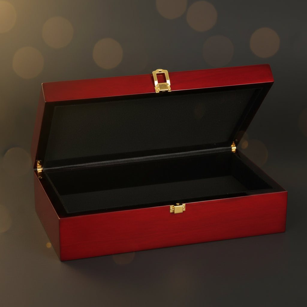 Red jewelry box with a gold clasp on a black background