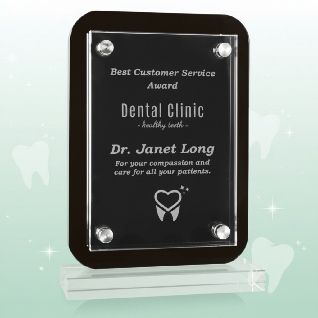 Plaque with engraved text for 'Best Customer Service Award' to a dental clinic and Dr. Janet Long.