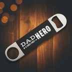 Bottle opener with 'Dad Hero' text on a black background
