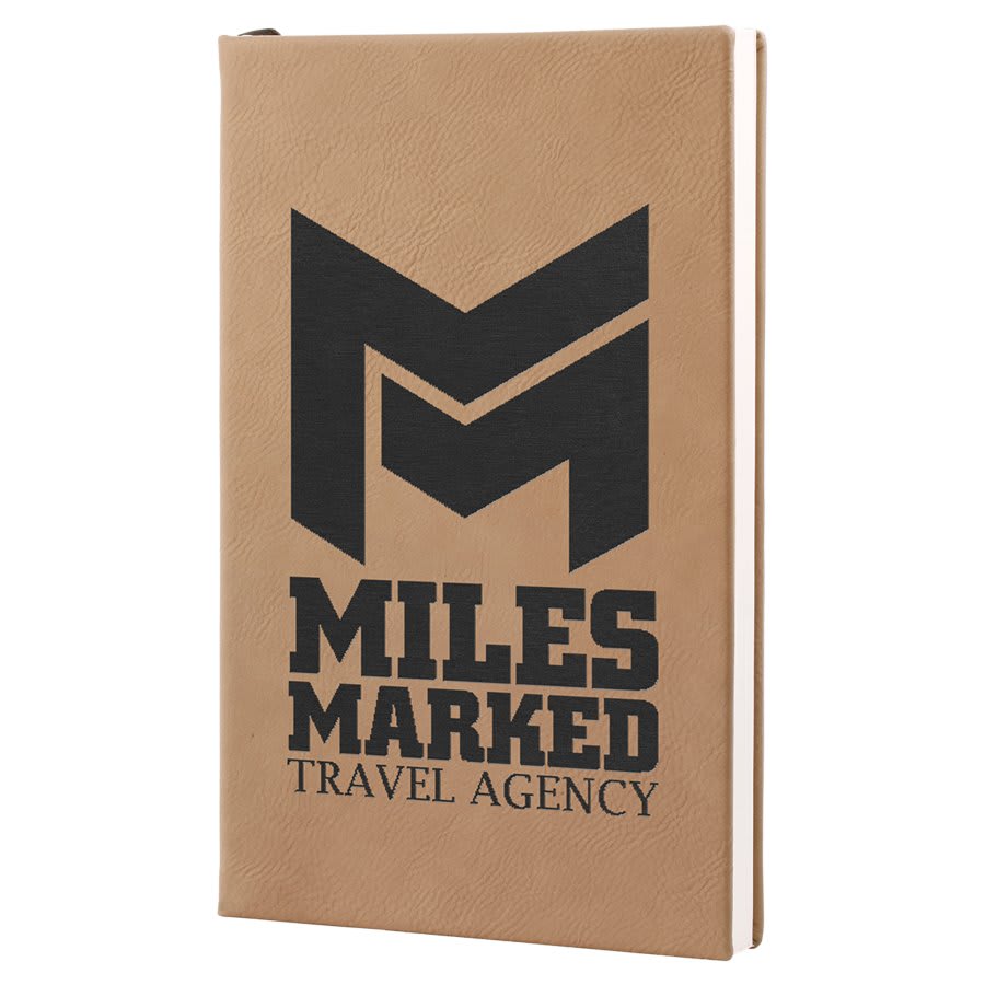 Beige notebook with 'Miles Marked Travel Agency' logo on a white background