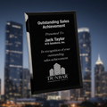 Black plaque with white text recognizing outstanding sales achievement to Jack Taylor of KTS Solutions, Inc.