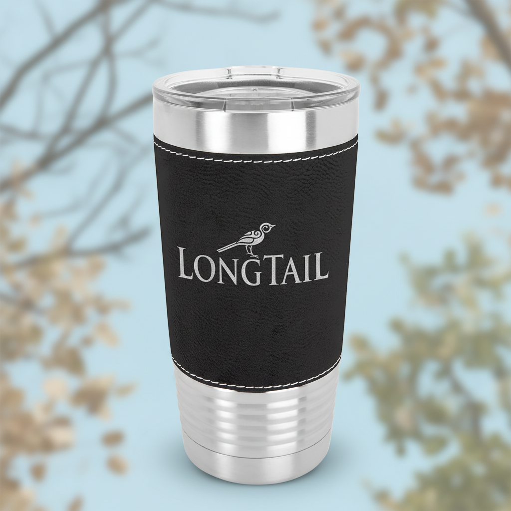 Silver tumbler with black leather wrap and 'Longtail' logo on a white background