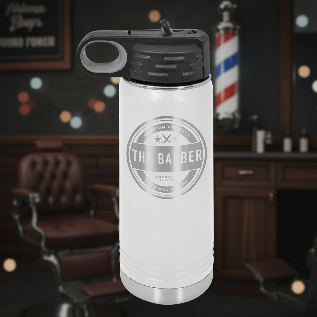 White insulated bottle with black lid featuring 'The Barber' logo on a white background