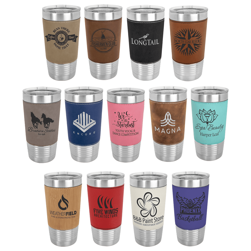 Collection of stainless steel tumblers with various designs and colors on a green background