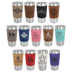 Collection of stainless steel tumblers with various designs and colors on a green background