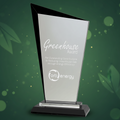 Glass award with black base on a clear background, featuring 'Greenhouse Award' and 'orb energy' logos.