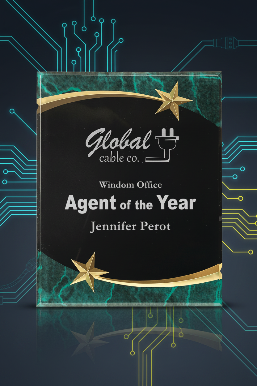 Awards plaque for 'Agent of the Year' with 'Global Cable Co.' branding on a green marble background.