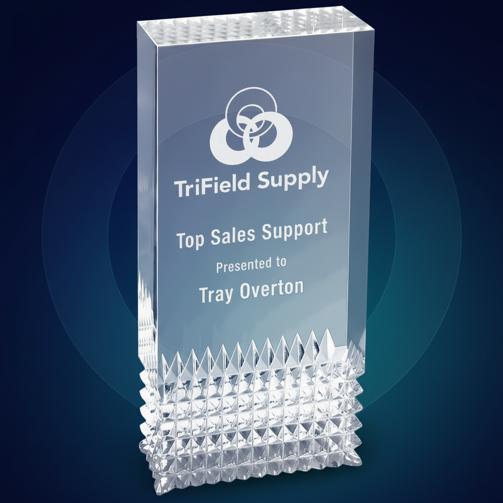 Crystal award with engraved text and TriField Supply logo on a white background